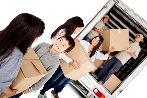 Man and van team using safety equipment during a residential move