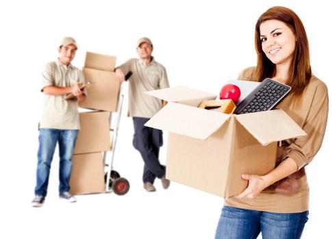 Crew handling boxes and furniture during a quick local move