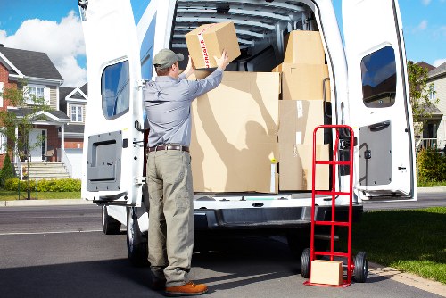 Professional Woodgreen moving service handling boxes and furniture with care