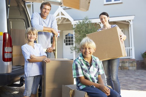 Professional movers loading furniture in Woodgreen