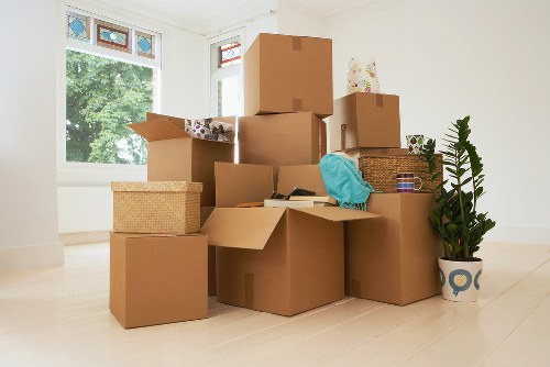 Careful box labeling and secure wrapping during a Woodgreen move