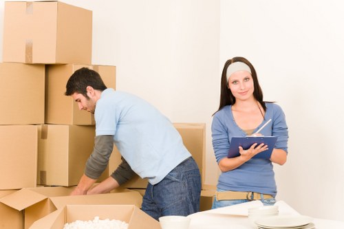 Professional office relocation team preparing equipment in Woodgreen